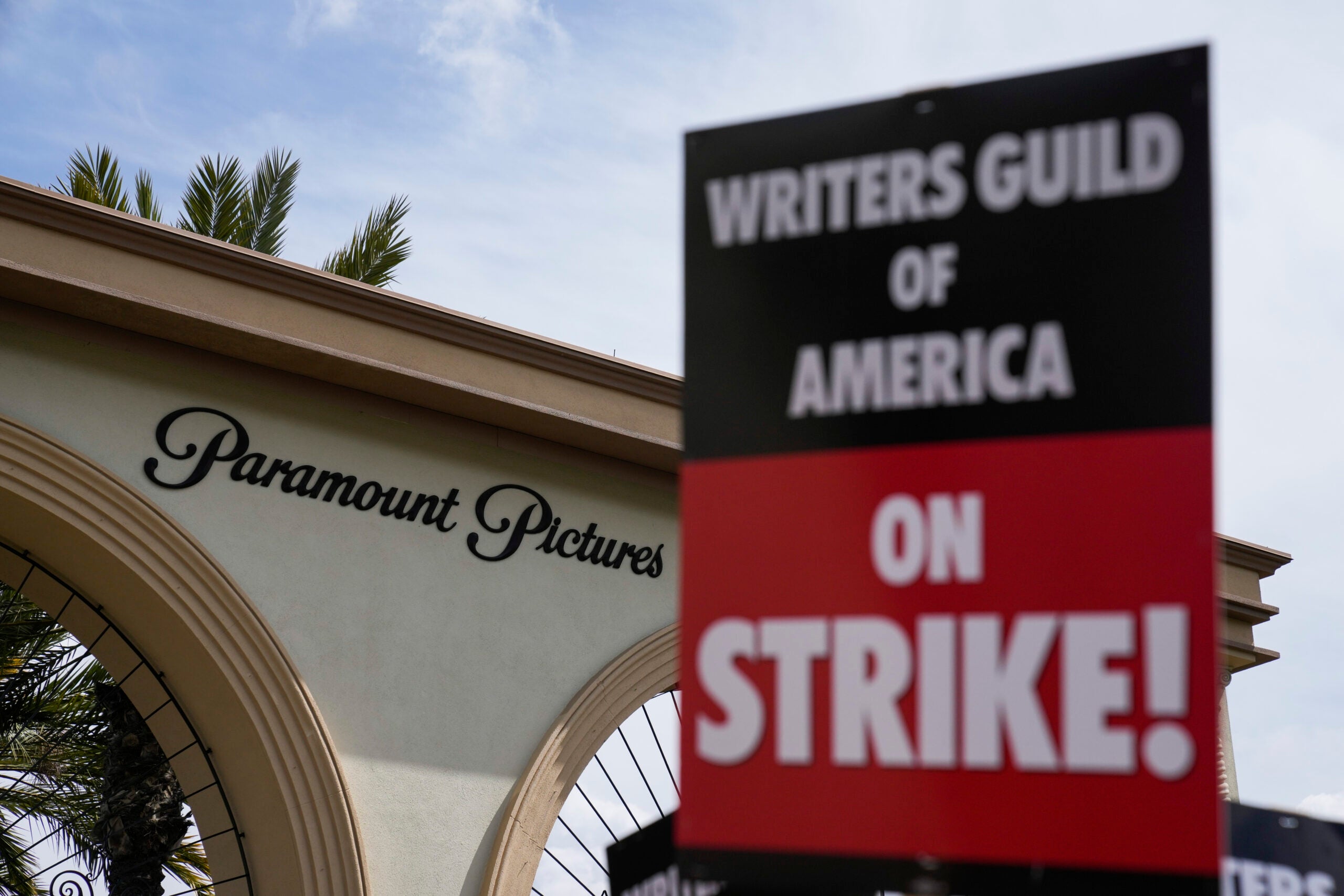 Members of the The Writers Guild of America picket outside Paramount Pictures in Los Angeles.