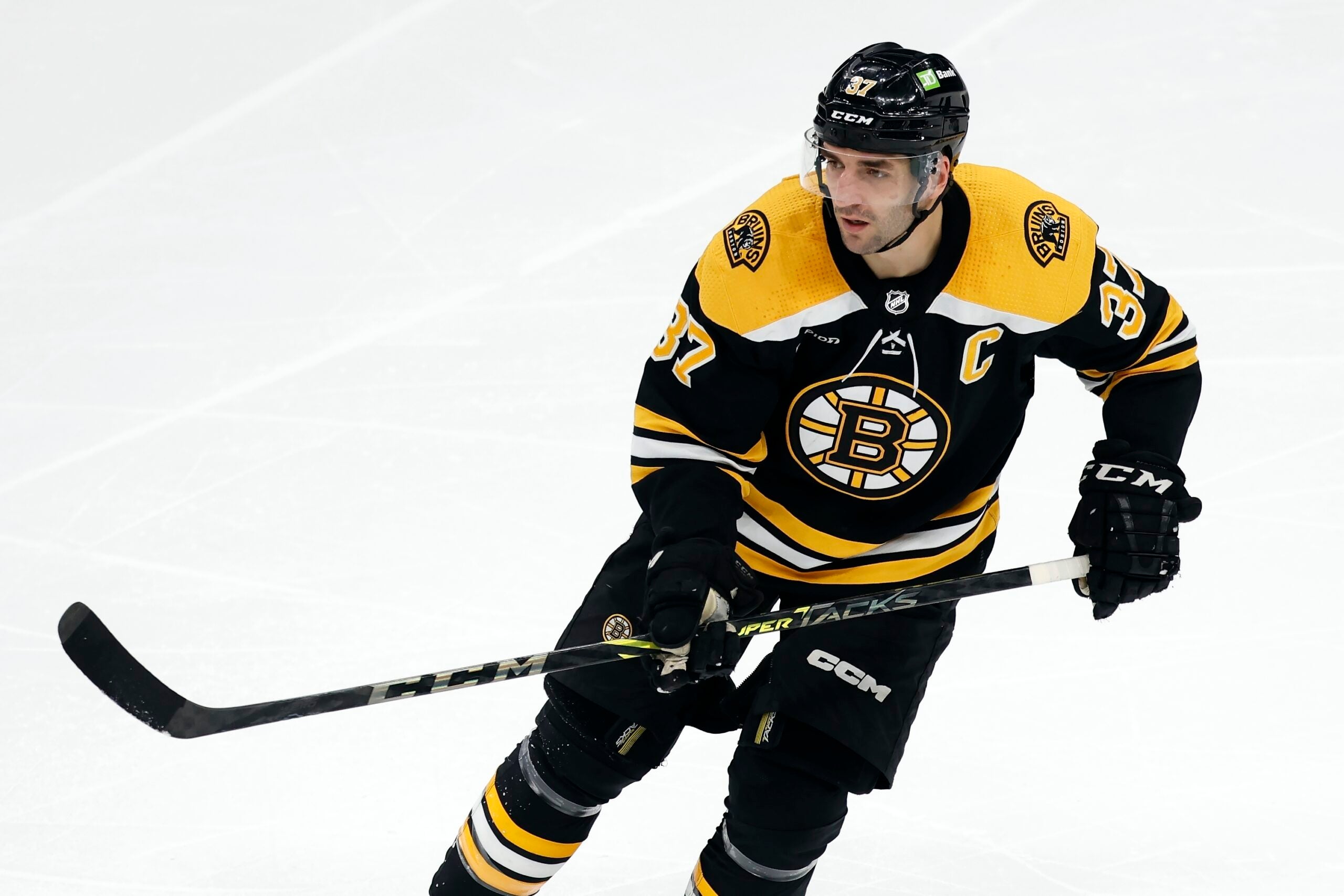Boston Bruins' Patrice Bergeron plays against the Tampa Bay Lightning during the second period of an NHL hockey game, Saturday, March 25, 2023, in Boston.