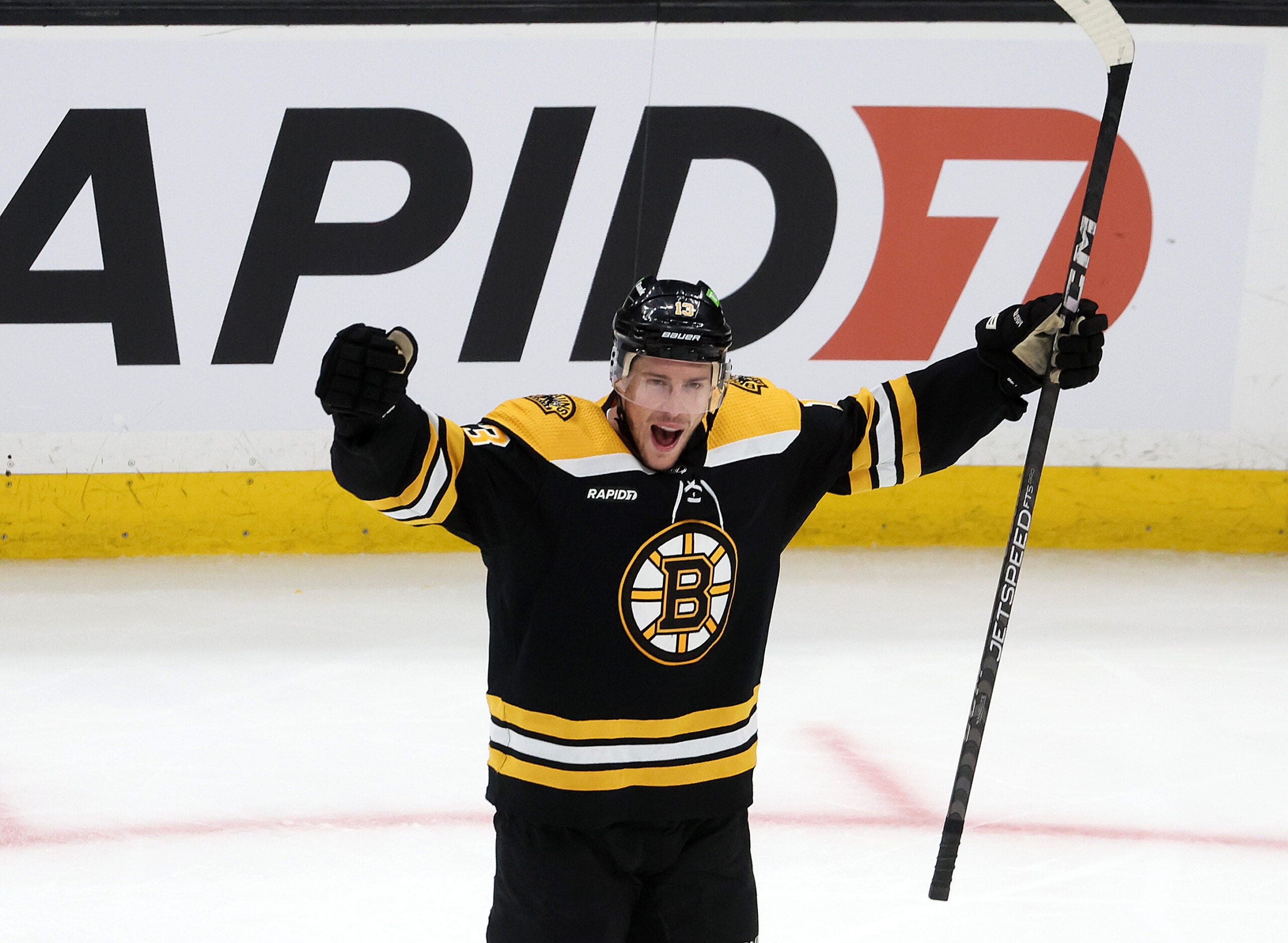 Boston Bruins center Charlie Coyle (13) celebrates his game tying goal scored in the third period. The Boston Bruins host the Toronto Maple Leafs on April 6, 2023 at TD Garden in Boston, MA.