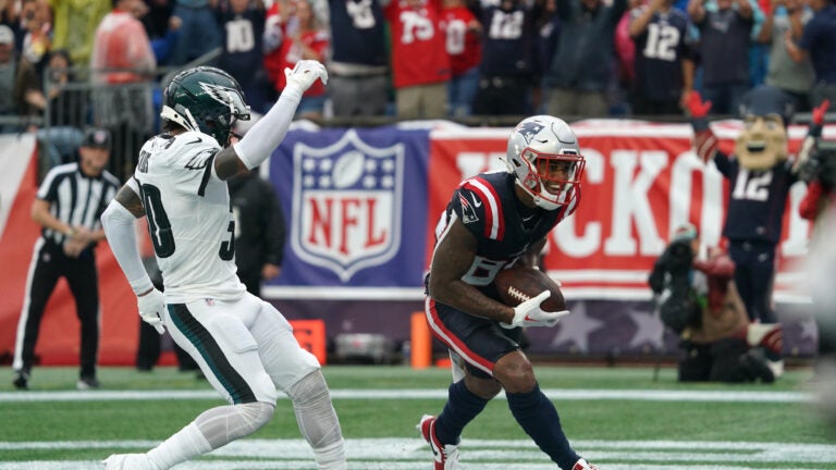 New England Patriots wide receiver Kendrick Bourne scores against Philadelphia Eagles safety Justin Evans.